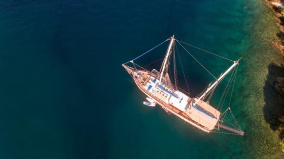 Gulet Malena lies in the clear waters off the coast of Split, Croatia.