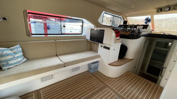 Cozy seating area in the salon of motor yacht Sea Shell in Marmaris.