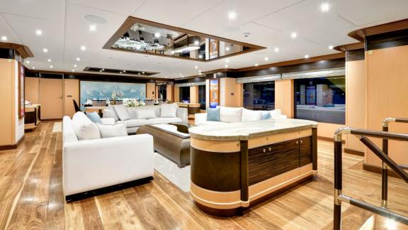 Luxurious living area of the Meira sailing yacht with stylish design and comfortable seating.