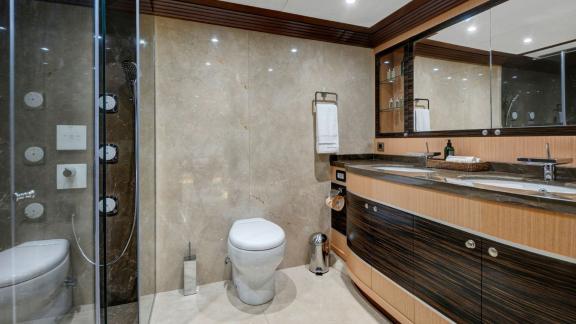 Stylish bathroom of the Meira sailing yacht with high-end fixtures and elegant decor.