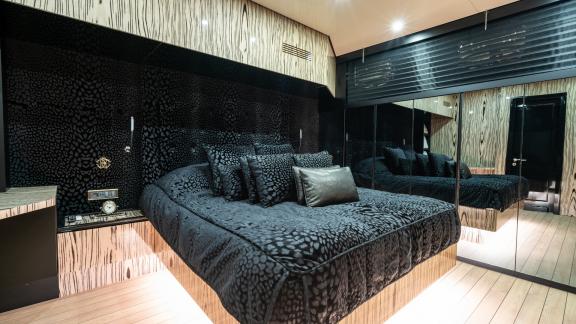 The big, luxurious bedroom of the Emanuel gulet In a modern style