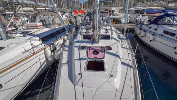 The foredeck of sailing yacht Zezo, docked in the marina.