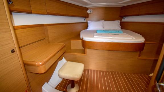 Spacious double cabin with large bed and work area