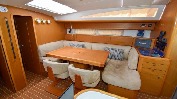 The saloon of the yacht Anja Sophie features a comfortable dining area.