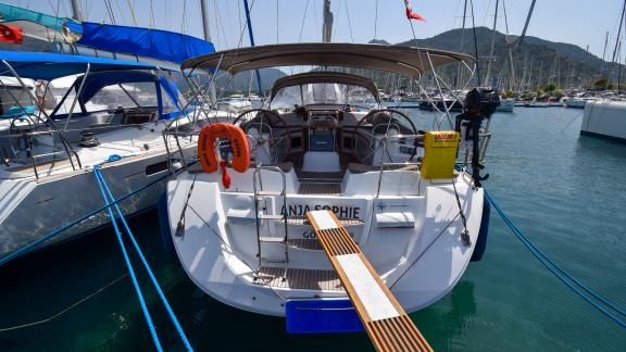 The aft deck of the yacht Anja Sophie with a gangway leading to the shore.