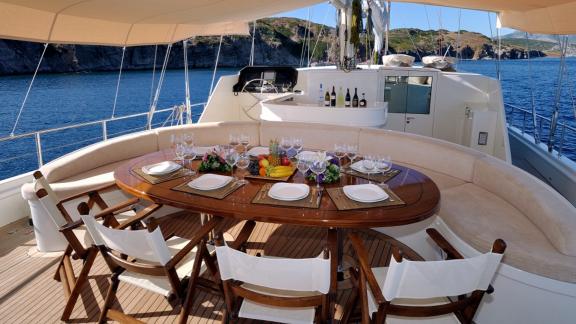 A table for eating and relaxing under a canopy in sunny weather