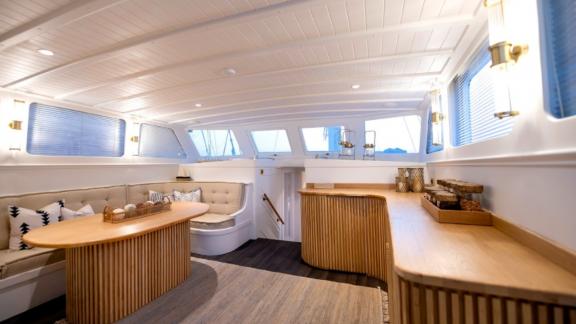 The interior of Liberte 11 offers comfort with modern decor and a spacious seating area.