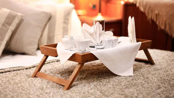 Stylishly arranged breakfast tray in the cozy bedroom of Gulet Nurten A.