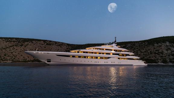 Luxury yacht Opari, elegant and modern, anchored near Greece's cliffs.