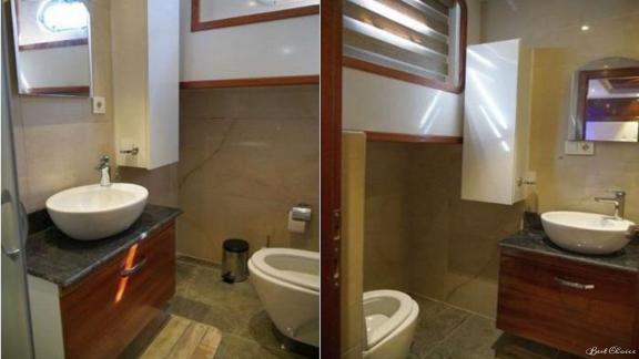 Marmaris'teki 6 kabinli gulet Şadiye Hanım'da mobilyalarla döşenmiş modern banyo.
