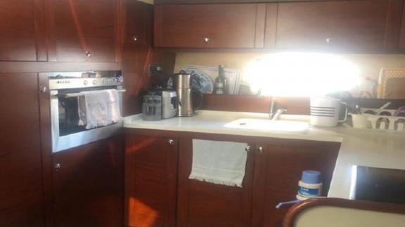 The spacious kitchen area of motor yacht Ayşe Sultan 1 is equipped with modern appliances.