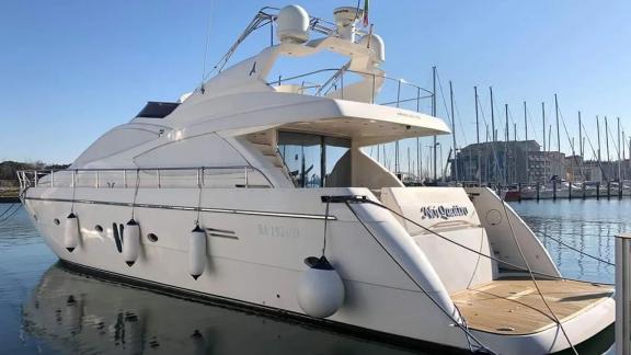 Abacus 70 Noi Quattro showcases its aft deck in Trogir Marina for daily and weekly motor yacht charters.