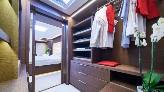 Elegant walk-in closet with ample storage space on Lagoon Seventy 7.