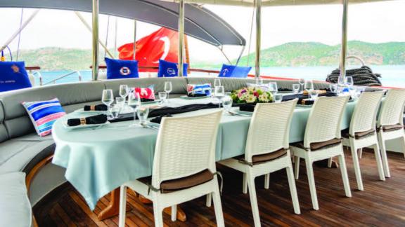 Gulet Questa Vita's aft deck dining table