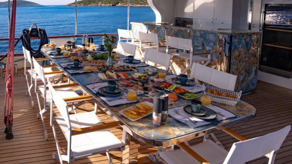 Dining table on the aft deck of luxury gulet Double Eagle