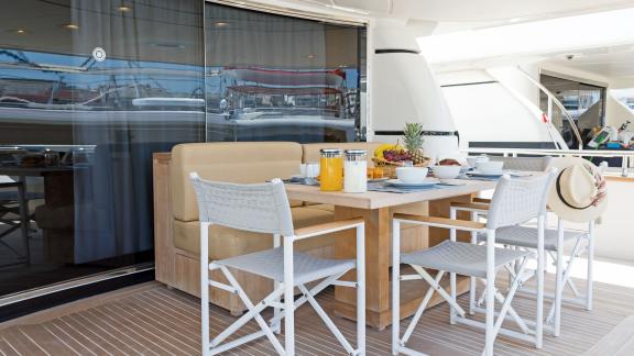 Stylishly set table for an outdoor breakfast on Alegria in Athens harbor.