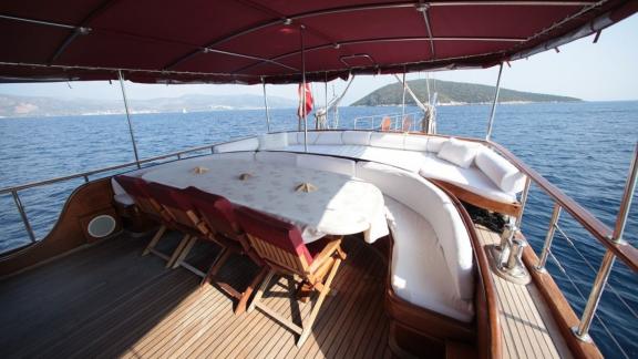 Shaded seating area on the Gulet Doris, perfect for relaxed dining with sea views.