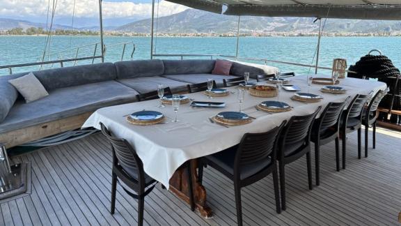 Elegant dining area on board Gulet Aria, perfect for dinner with views of Fethiye Bay.