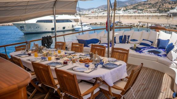 Dining and living area on the aft deck of luxury gulet Babylon picture 1