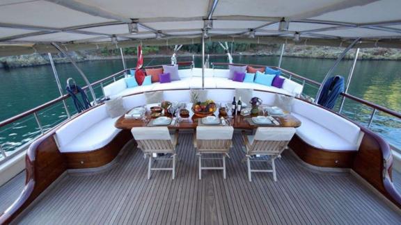 The stylish dining area of the gulet Dear Lila offers space for convivial meals on board.