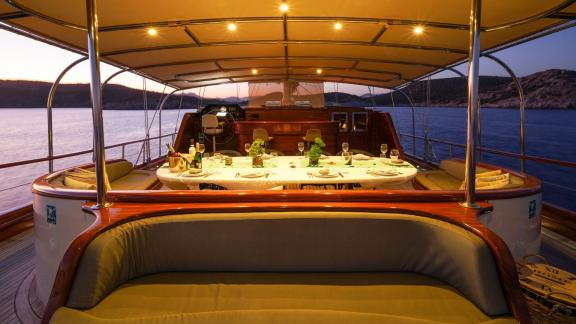 An elegantly laid table for dinner on the gulet La Bella Vita in Bodrum