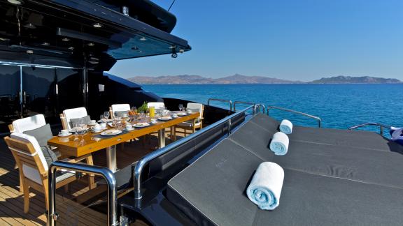 Enjoy a delicious breakfast aboard the luxurious motor yacht O'Pati with a sea view.