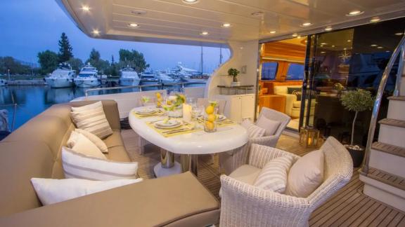 Elegantly set dining table on yacht Amoraki.