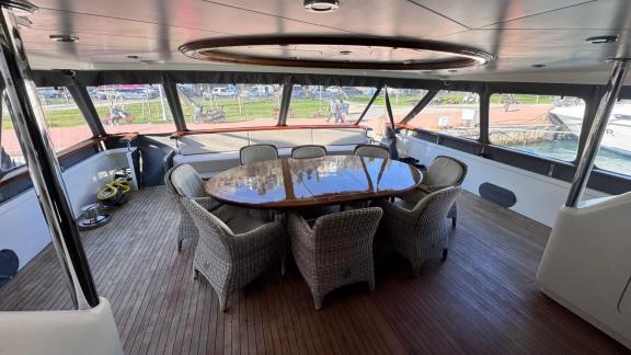 Among Göcek yacht charter options the 5 cabin 10 guest River Storm motor yacht features an aft deck with dining table an