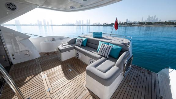 The aft deck of the Outlaw yacht adds style and serenity to your Dubai yacht rental experience.