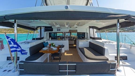 Spacious seating and elegant setup with Aegean views.