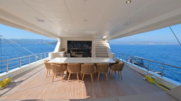 For Fethiye yacht charter the 6 cabin 12 guest Dodo motorsailer features a spacious aft deck with dining area.
