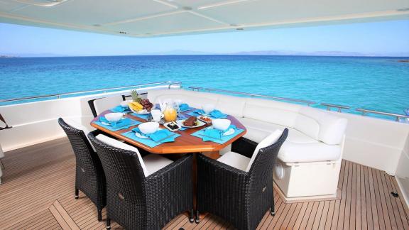 Luxurious dining area with sea view on the yacht Kentavros 2, enjoy breakfast in the open air.