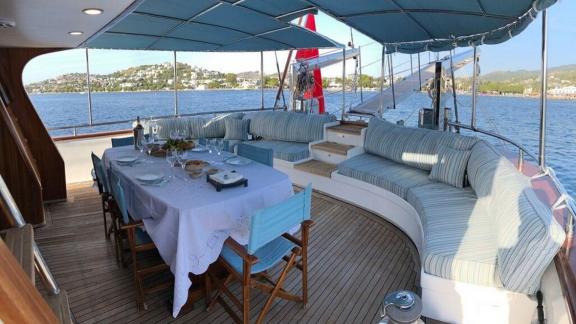 Enjoy your meals in the stylish dining area on a Gulet in Göcek with a beautiful view.