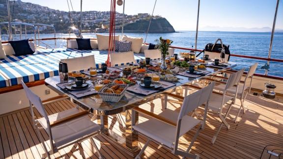 Dining and seating area on the aft deck of luxury gulet Double Eagle