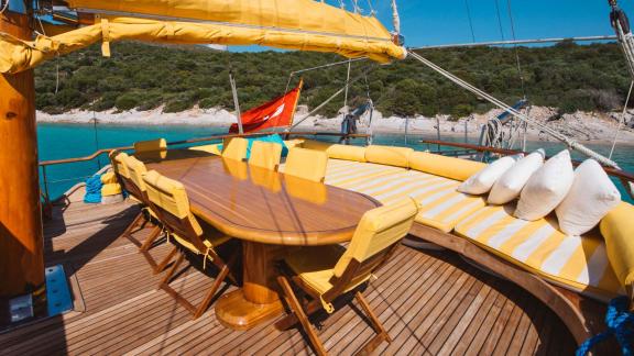 Enjoy a delicious outdoor meal aboard the stylish Gulet Myra.