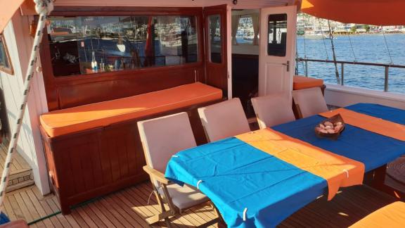 Enjoy your meals in the cozy dining area of Gulet Arancia in Bodrum, Turkey.