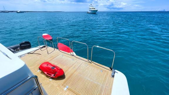 The swimming platform of motor yacht Riva 21 provides sea access with water sports equipment.