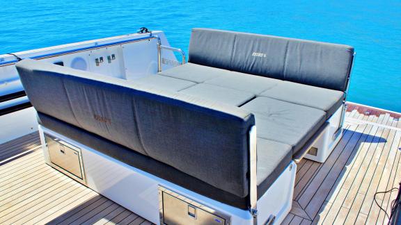 The motor yacht Celebrate offers a spacious seating area, perfect for relaxing with ocean views.