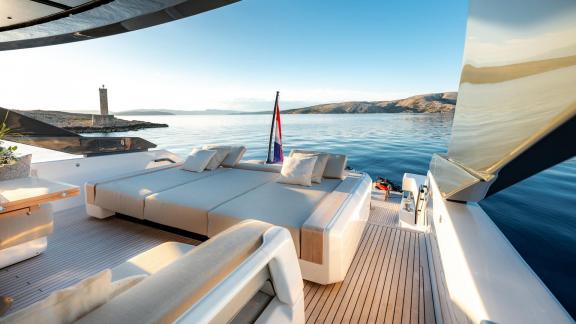 Motor yacht Kimani offers a relaxing aft deck area aboard Bluegame BG74.