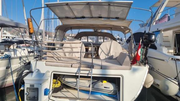 The aft deck of the Princess Ela sailing yacht, anchored in Bodrum, featuring comfortable seating areas and equipment.