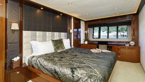 Elegant and cozy bedroom with a stunning view aboard the Motoryacht Agave in Split.