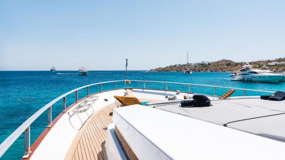 Shiva features a foredeck sun deck for daily motor yacht charters and exclusive sea escapes in Mykonos.