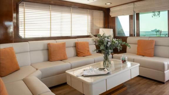 Shiva features a spacious lounge for daily motor yacht charters and comfortable island cruises in Mykonos.