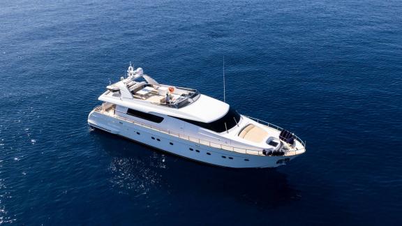 The elegant motor yacht Alegria in the deep blue waters off Athens, perfect for luxury charter experiences.