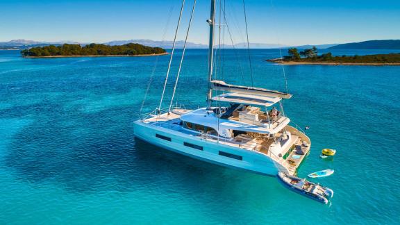 Stylish Amada Mia catamaran anchored off the stunning Adriatic coast near Split, Croatia