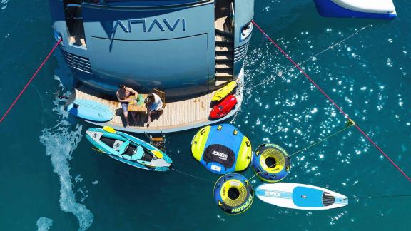 Various water toys and activities on the aft platform of the motor yacht Anavi.