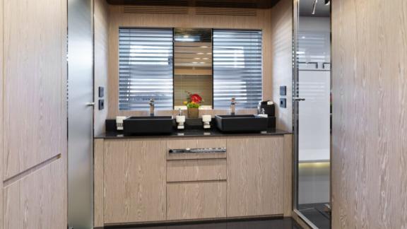 A sleek, wood-accented design offering comfort and functionality at sea.