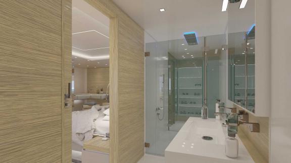 Motoryatta konforlu kabine doğrudan erişimi olan modern banyo.