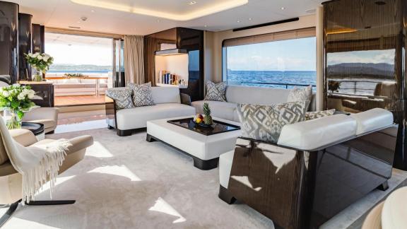 Nemesis motor yacht offers a spacious and luxurious lounge area in Mallorca.