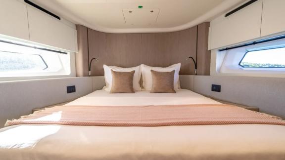 In Sibenik motor yacht charter option Nalu cabin with large bed and modern design offering comfortable stay experience v